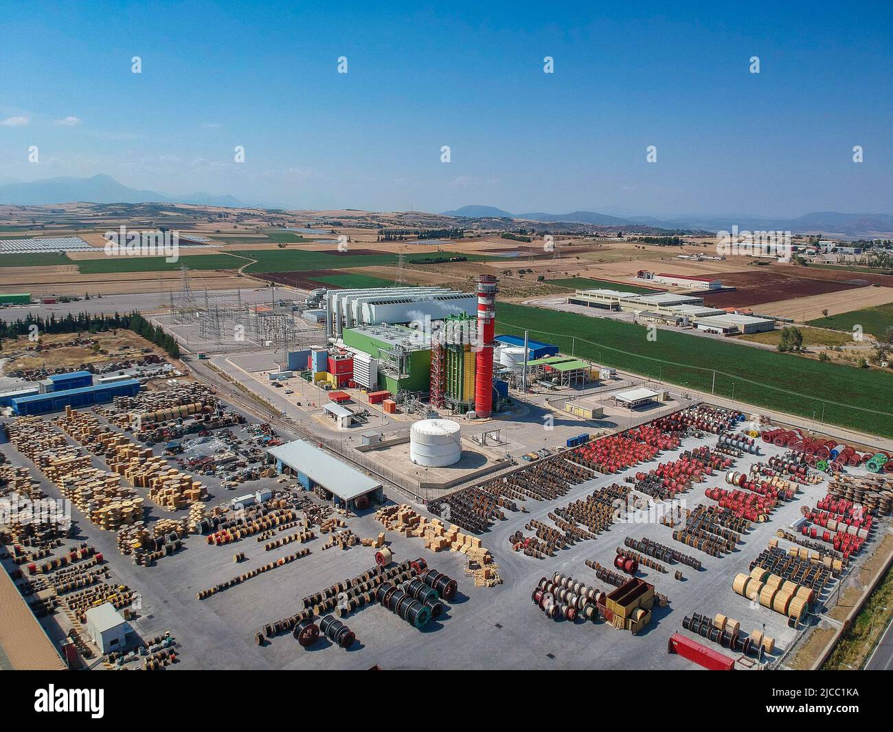 Artial view of CCGT Power Plant Thermoelectric plant near city of Thiva, in the region of Viotia, Greece. Thermal power station is a power station in Stock Photo