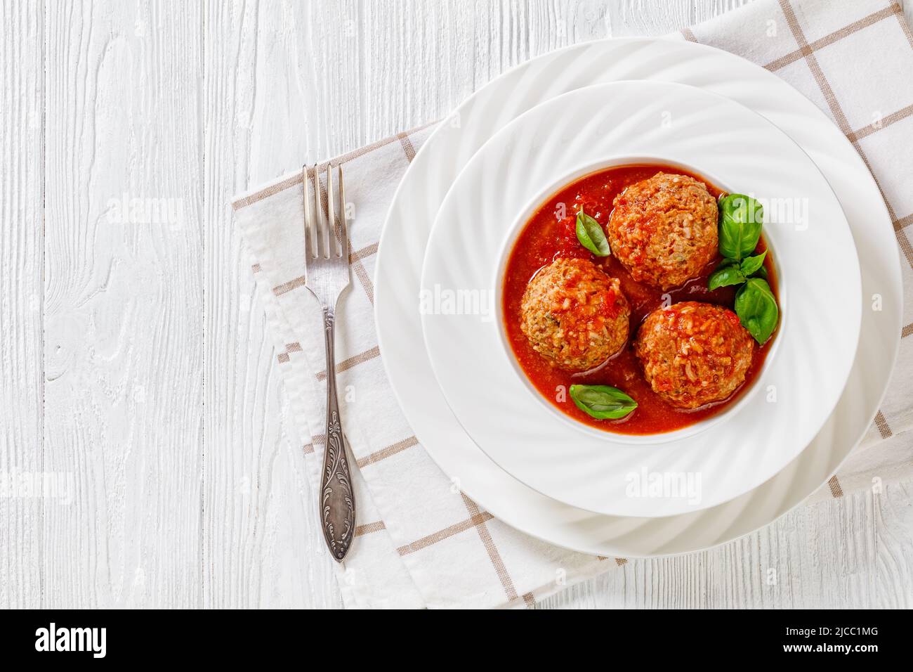 Porcupine Balls, ground beef and rice meatballs in tomato sauce with