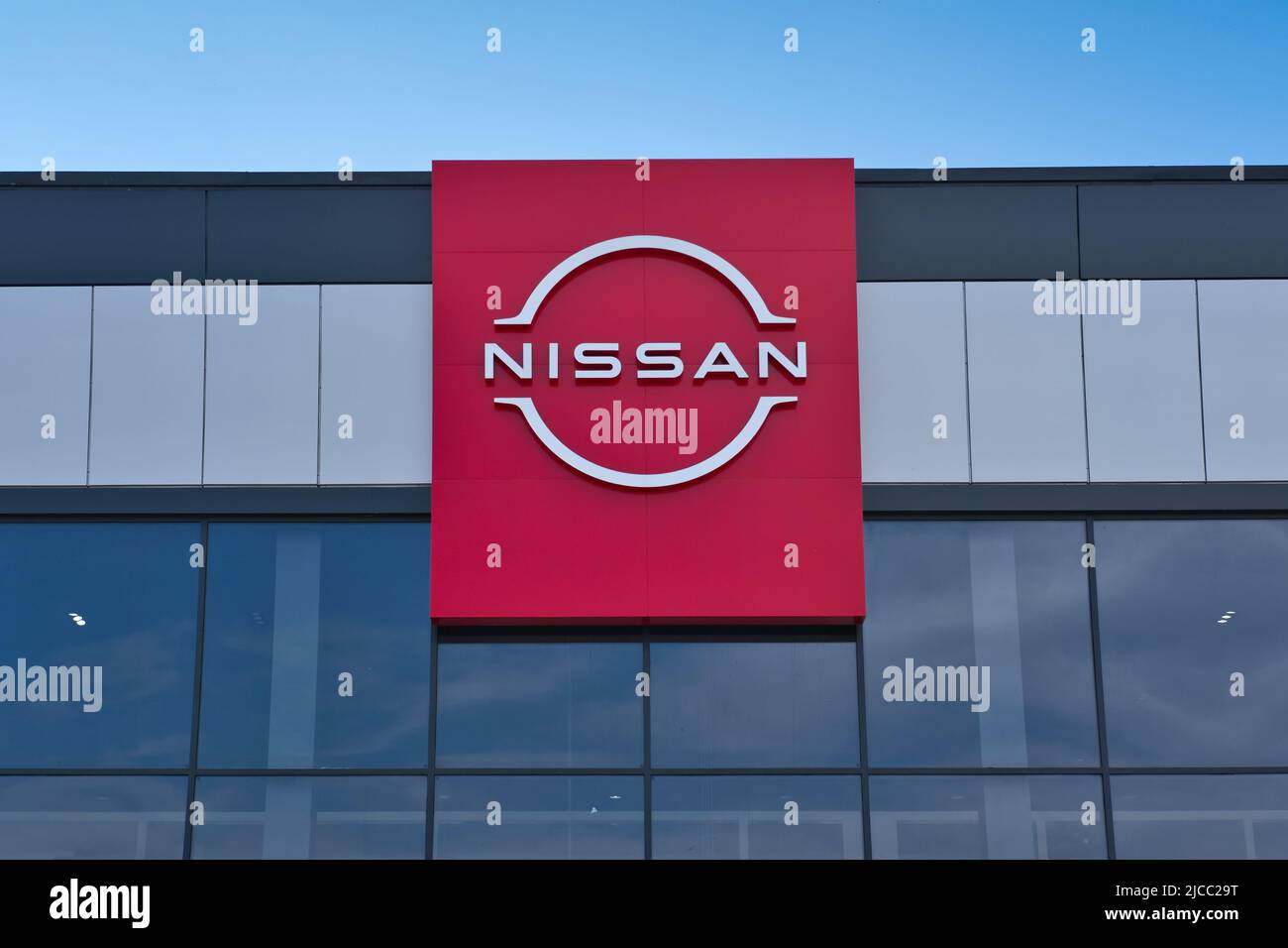 Building of Nissan car selling and service center with Nissan logo
