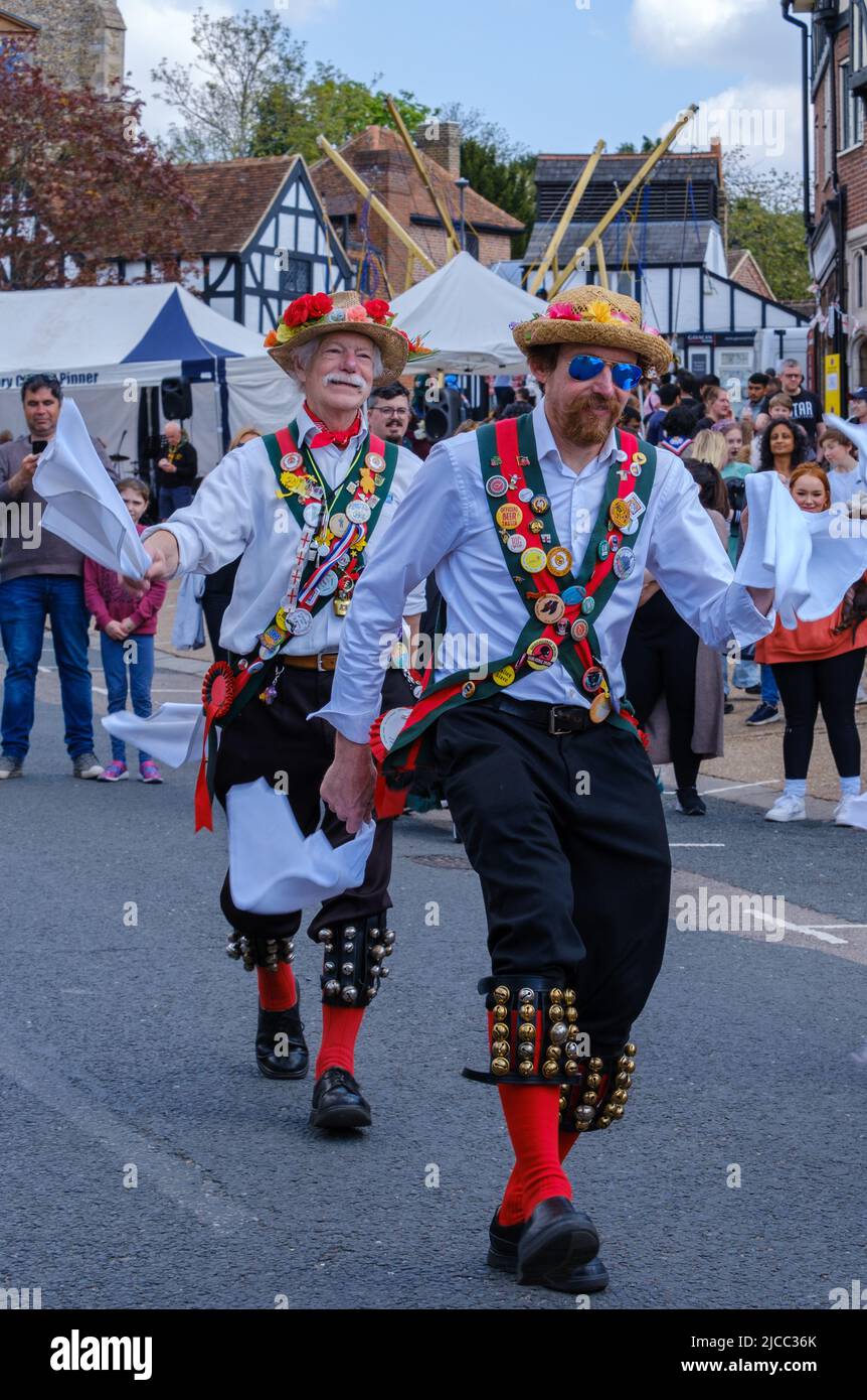 Merrydowners Morris dancers on Pinner High Street at St George’s Day Celebration 2022. Northwest London, England. Stock Photo
