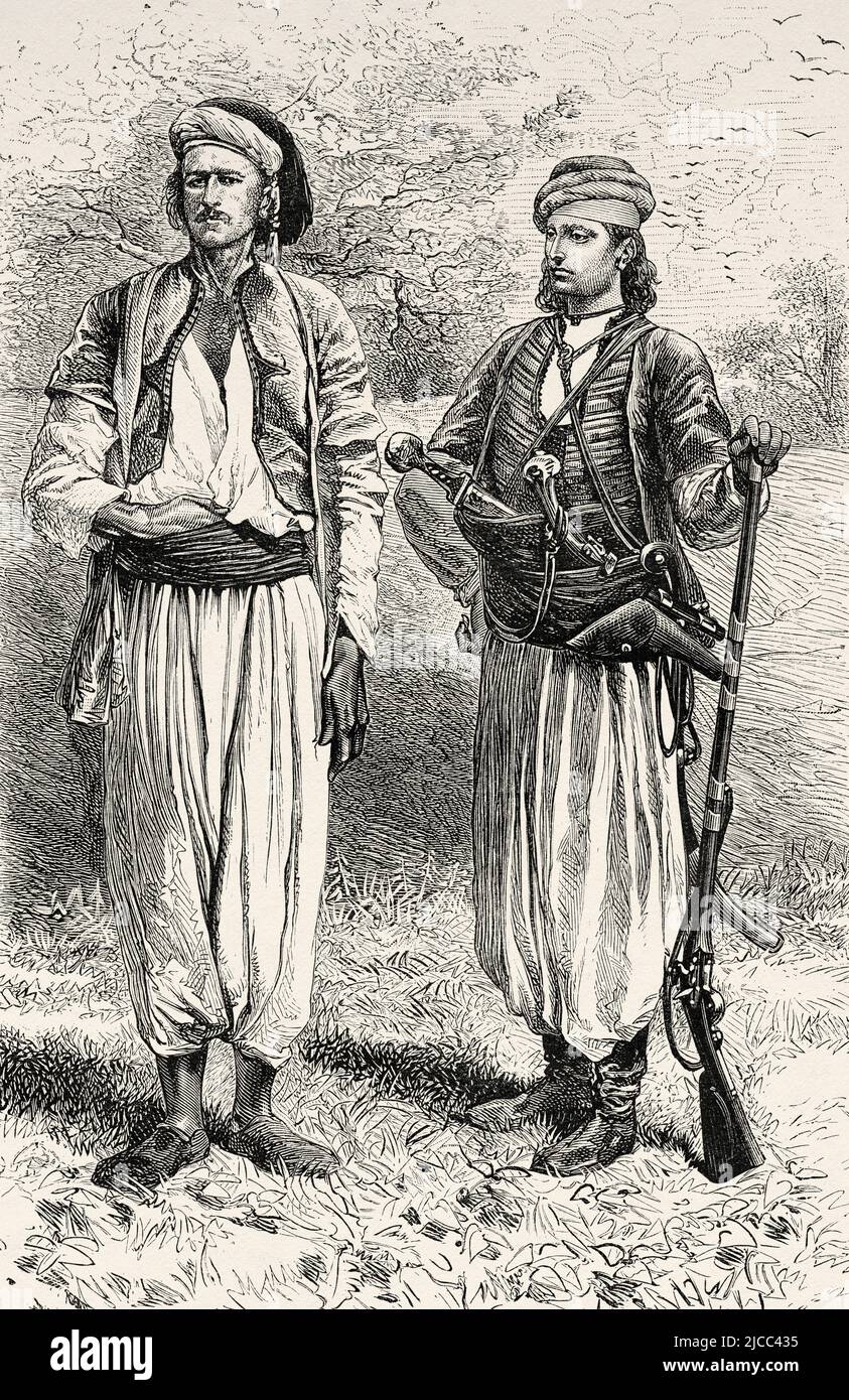 Arab men dressed in typical and traditional clothing of the Nusayriyah Mountains. Syria, Middle East. The Nusayris by Léon Cahun 1878. Le Tour du Monde 1879 Stock Photo