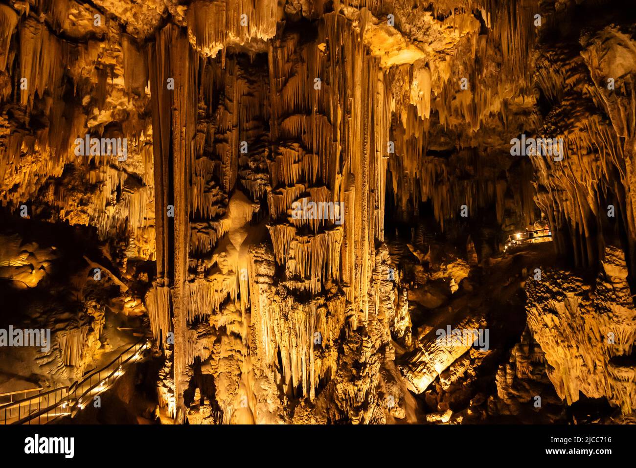 Mighty stalactites and stalagmite form the impressive scenery of the 'Cueva de Nerja” dripstone cave, near Málaga, Andalusia, Spain Stock Photo