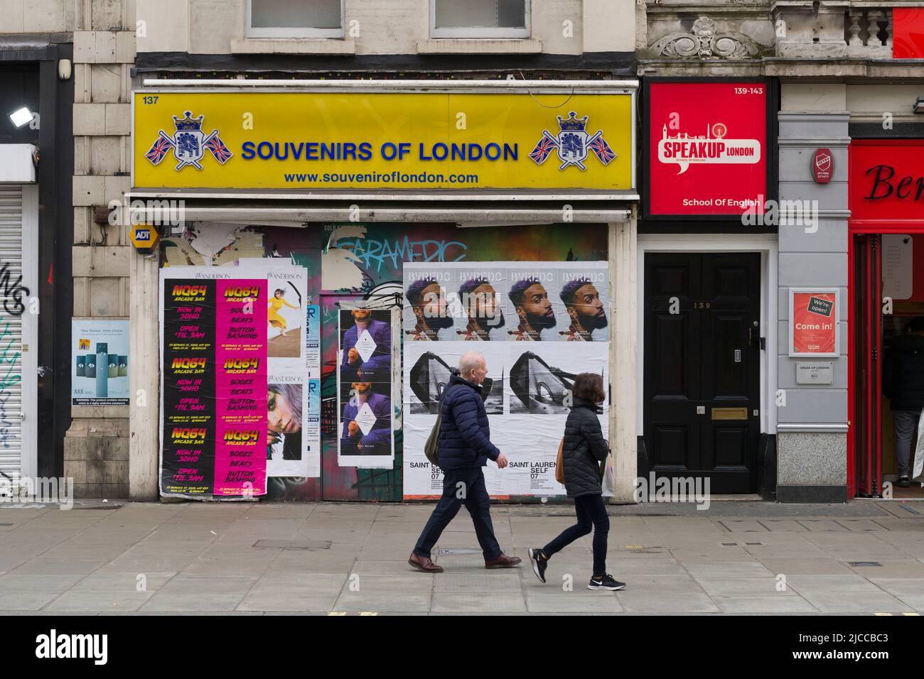 Pedestrians walking past closed down and boarded up shops on Oxford Street, City of Westminster, London, UK.  5 Jun 2022 Stock Photo
