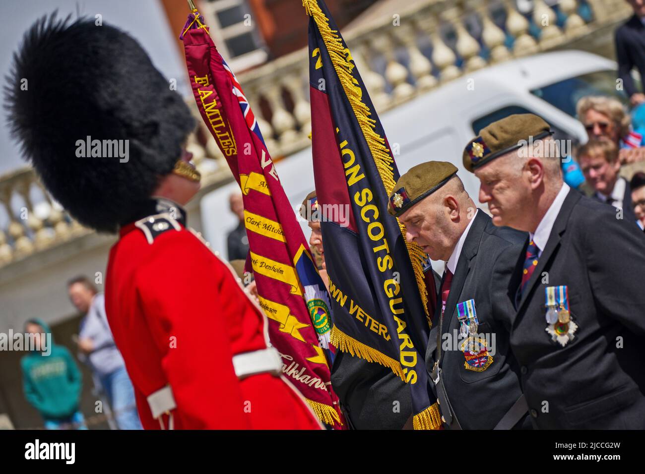 Veterans and members of the 2nd Battalion the Scots Guards, in Blackpool, Lancashire to mark the