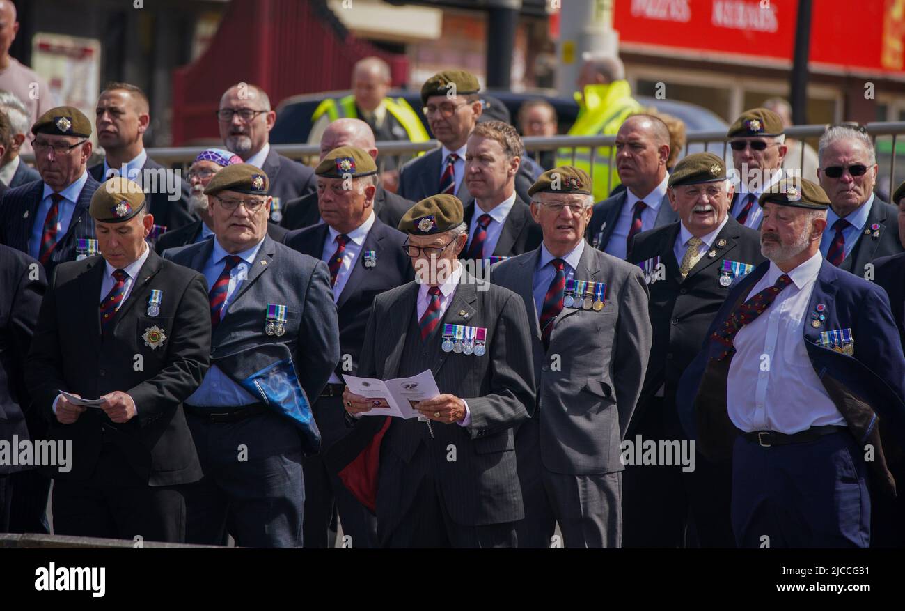 Veterans and members of the 2nd Battalion the Scots Guards, in Blackpool, Lancashire to mark the