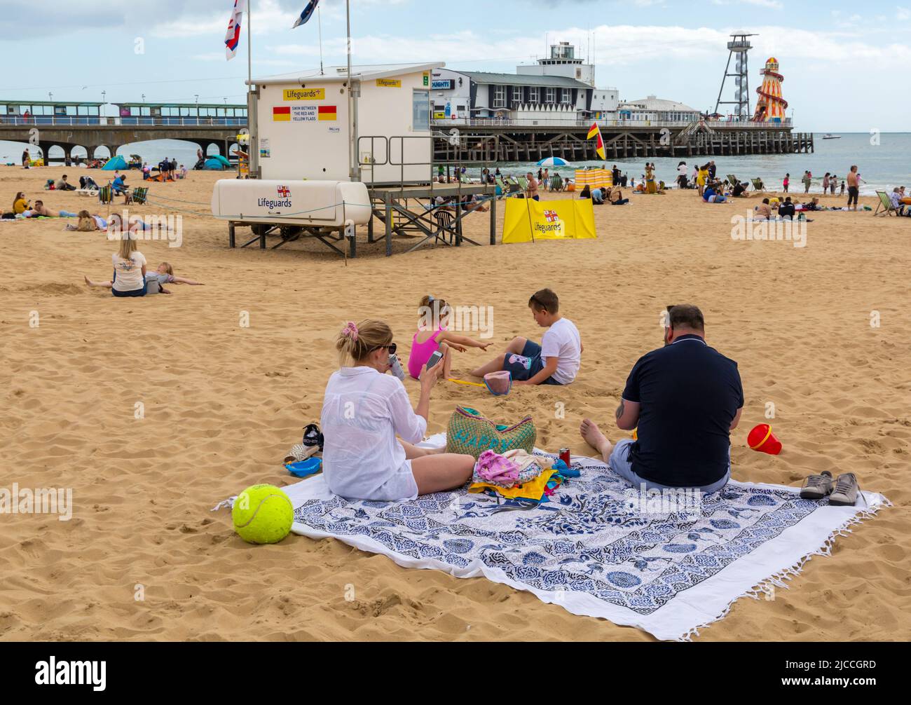 Bournemouth, Dorset UK. 12th June 2022. UK weather: sunny intervals and breezy at Bournemouth beaches as sunseekers head to the seaside. Credit: Carolyn Jenkins/Alamy Live News Stock Photo