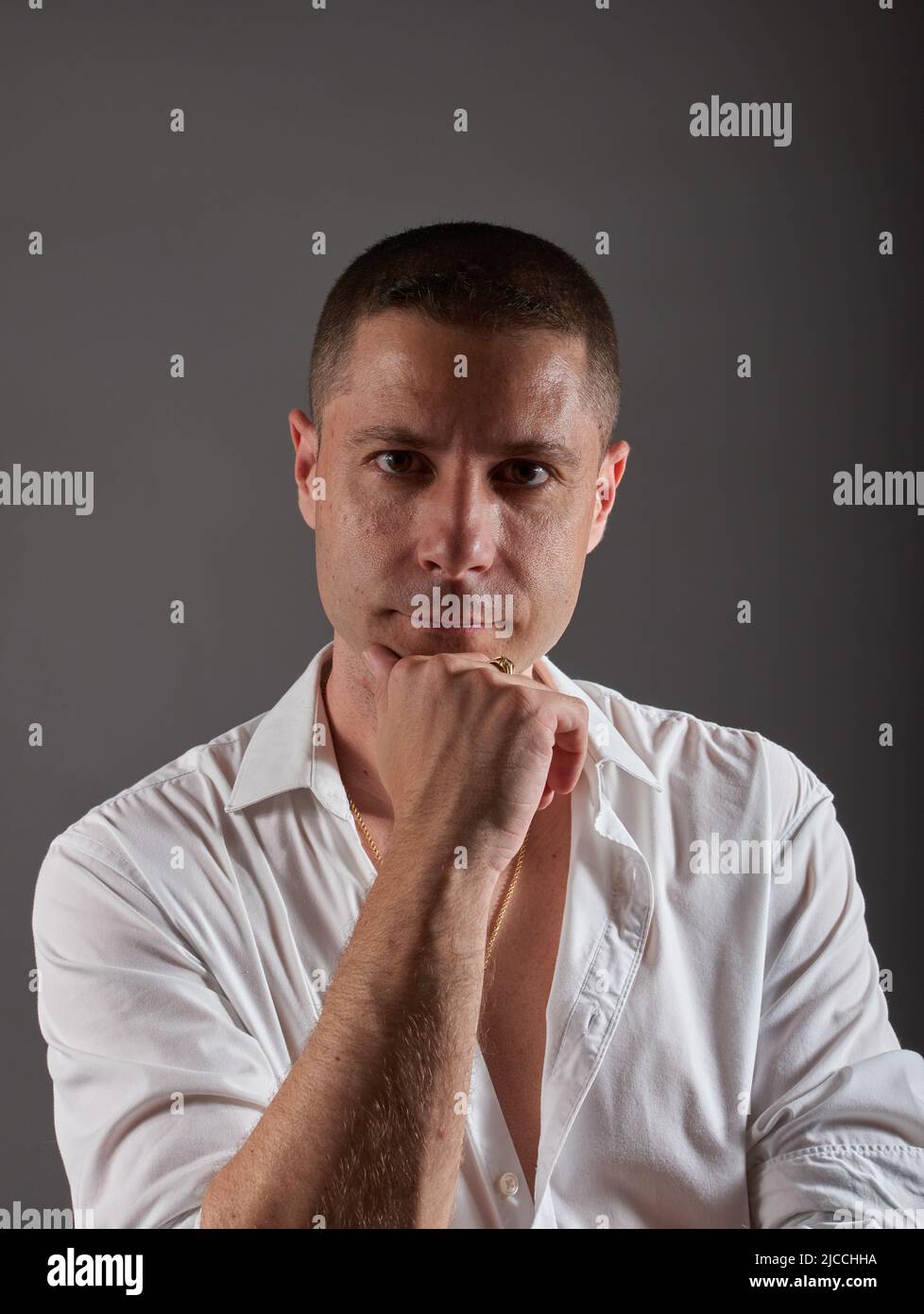 Male model posing indoor hi-res stock photography and images - Alamy