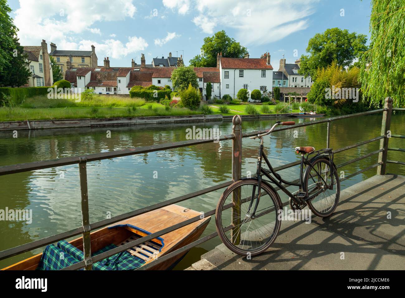 Bicycle parked on the riverside in Cambridge, England. Stock Photo