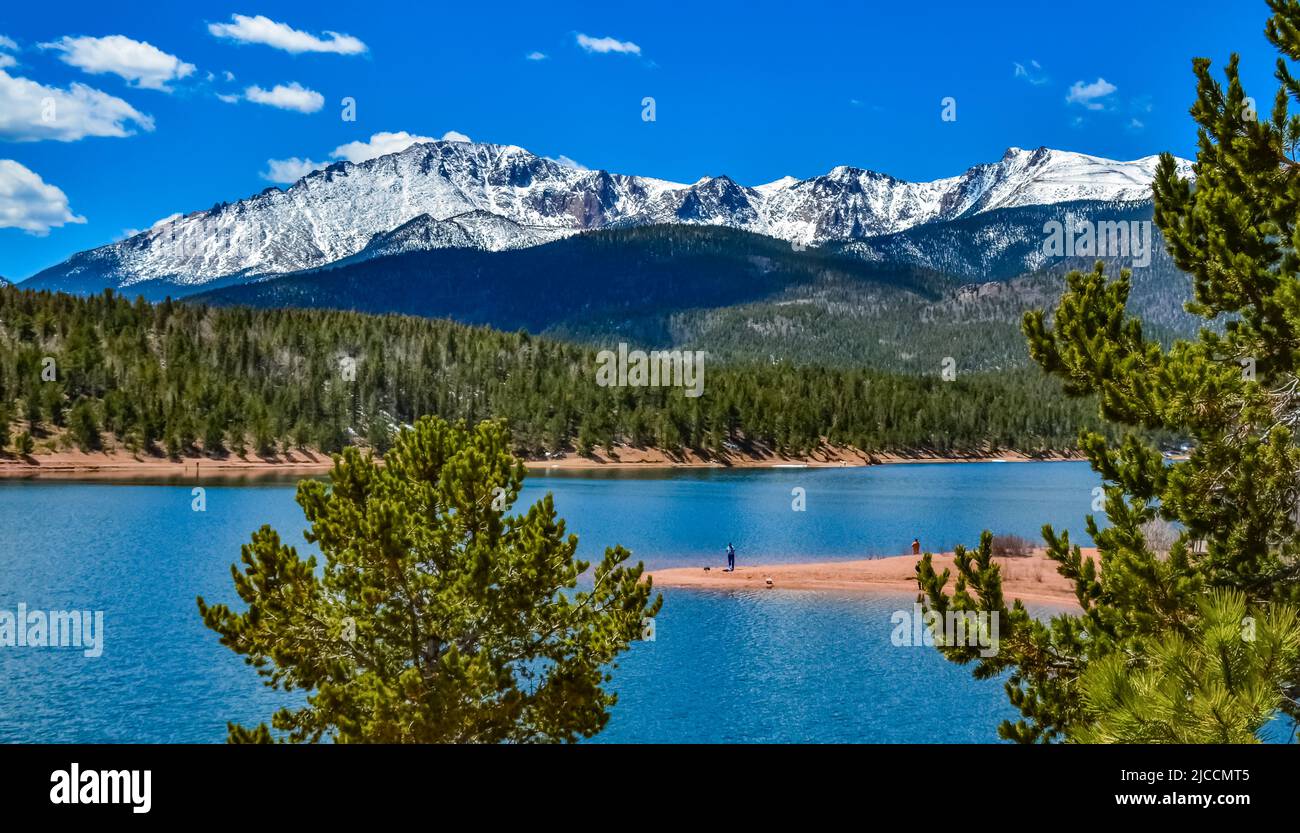 Pikes Peak panorama. Snowcapped and forested mountains near a mountain