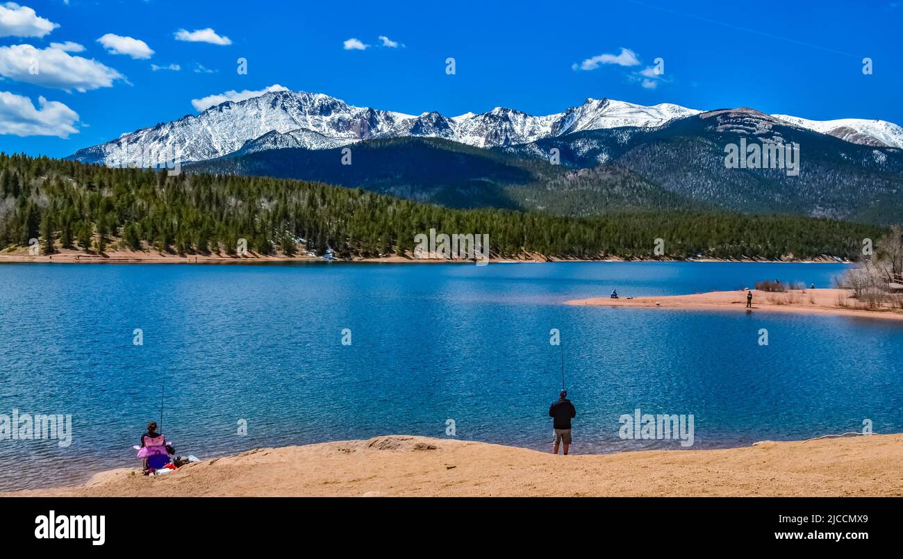 Pikes Peak panorama. Snowcapped and forested mountains near a mountain