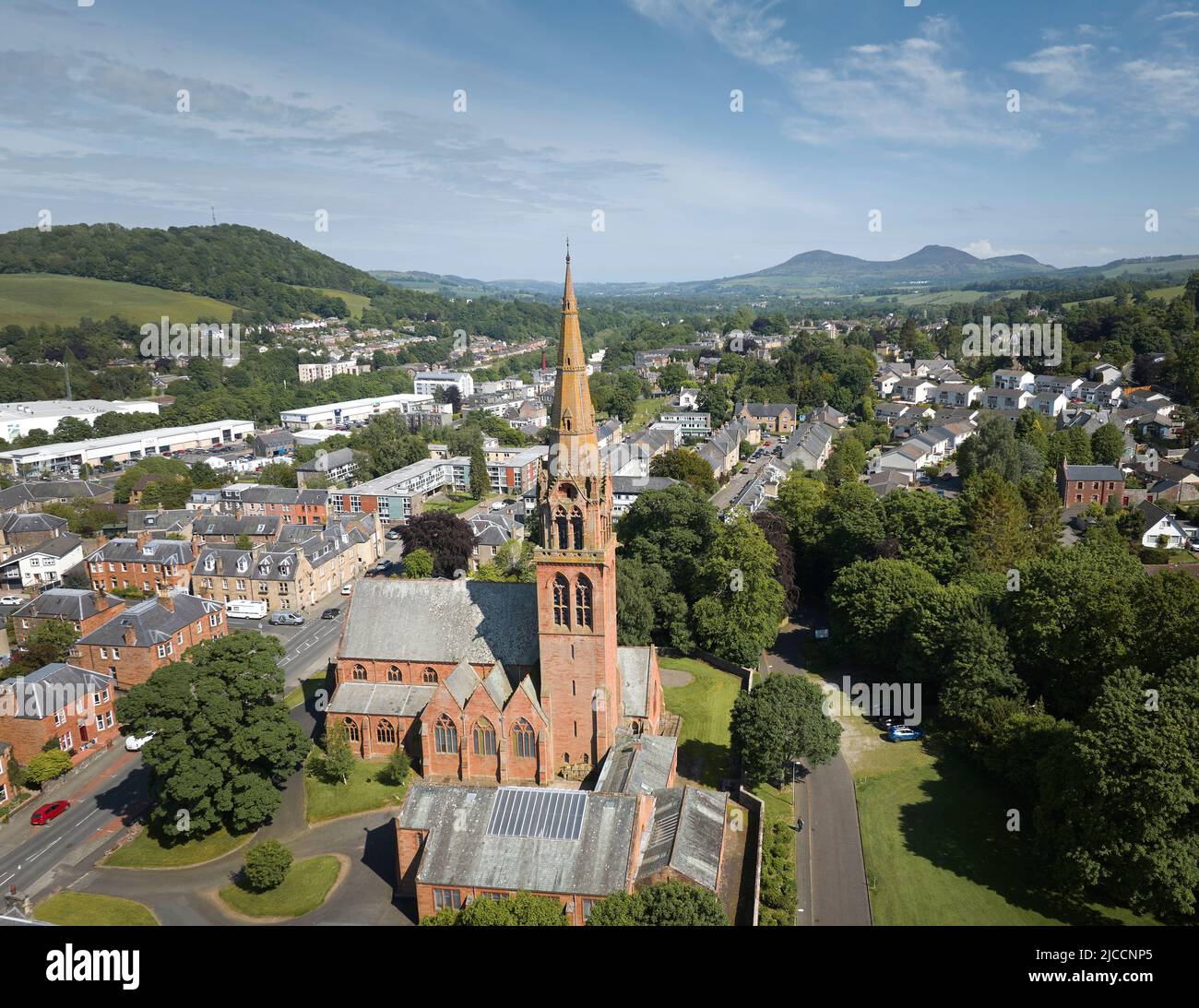 Aerial shot of Galashiels in the Scottish Borders with Old Parish & St Paul’s Church in the foreground. Looking E towards the Eildon Hills. Stock Photo