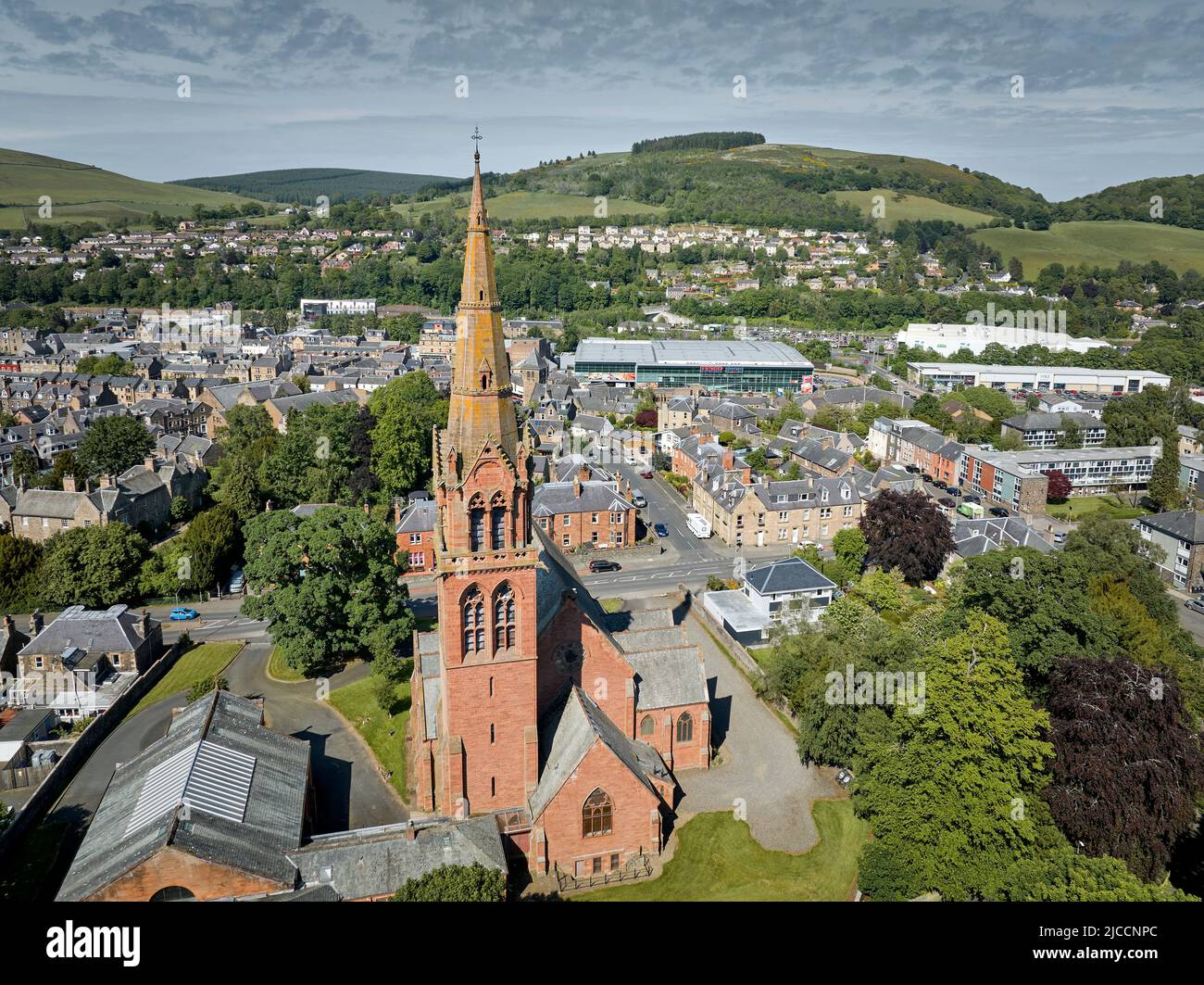 Aerial shot of Galashiels in the Scottish Borders with Old Parish & St Paul’s Church in the foreground. Looking N towards Ladhope Moor. Stock Photo