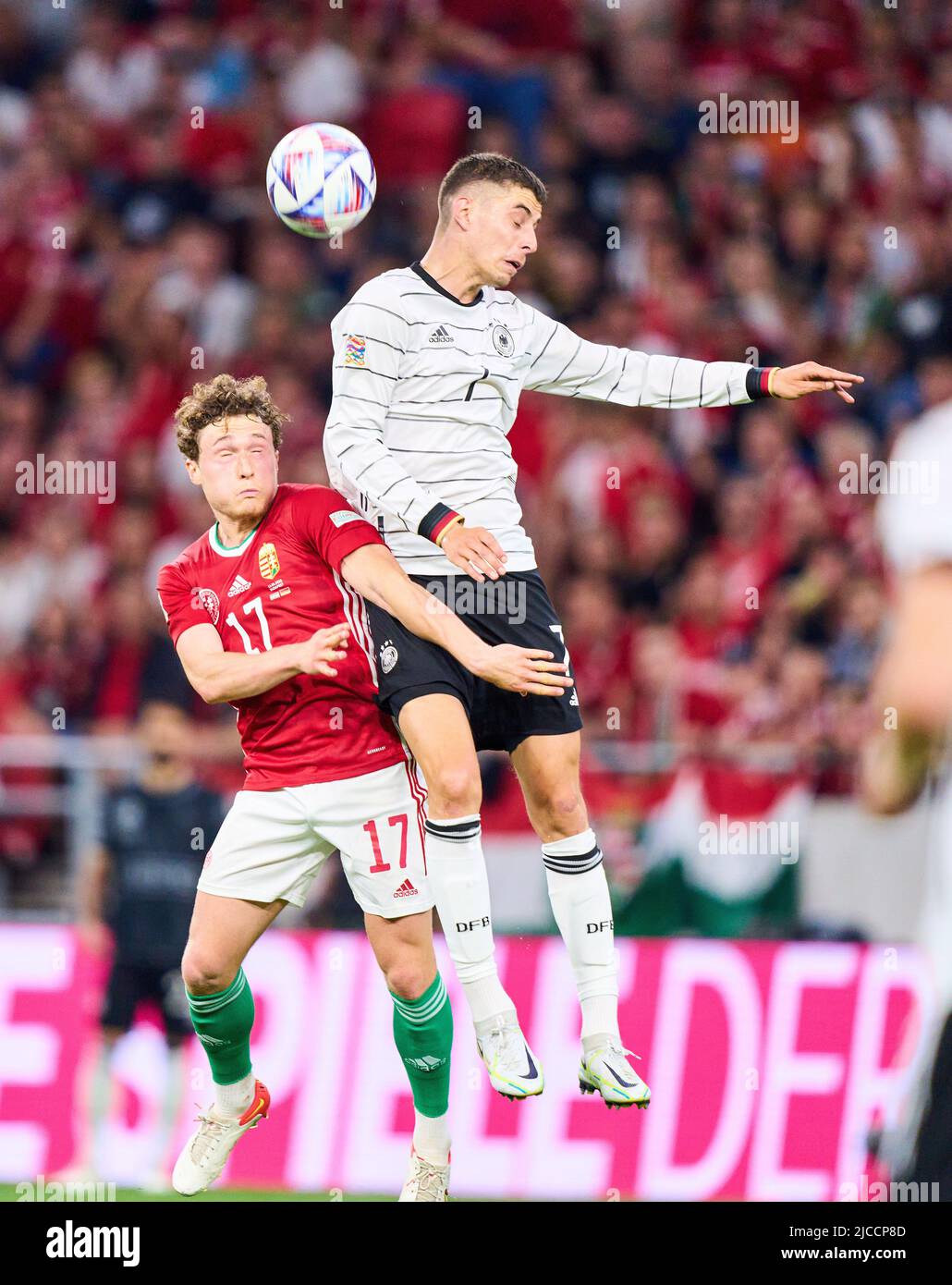 Kai Havertz, DFB 7  compete for the ball, tackling, duel, header, zweikampf, action, fight against Callum Styles, HUN 17  in the UEFA Nations League 2022 match HUNGARY - GERMANY 1-1  in Season 2022/2023 on Juni 11, 2022  in Budapest, Hungary.  © Peter Schatz / Alamy Live News Stock Photo