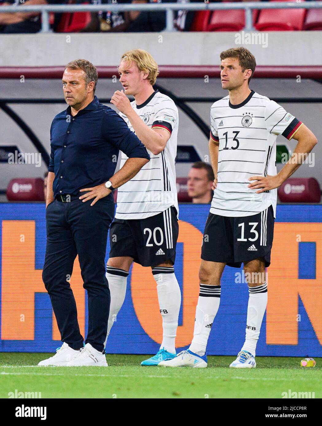 DFB headcoach Hans-Dieter Hansi Flick , Bundestrainer, Nationaltrainer, Thomas Müller, DFB 13 Julian Brandt, DFB 20  in the UEFA Nations League 2022 match HUNGARY - GERMANY 1-1  in Season 2022/2023 on Juni 11, 2022  in Budapest, Hungary.  © Peter Schatz / Alamy Live News Stock Photo