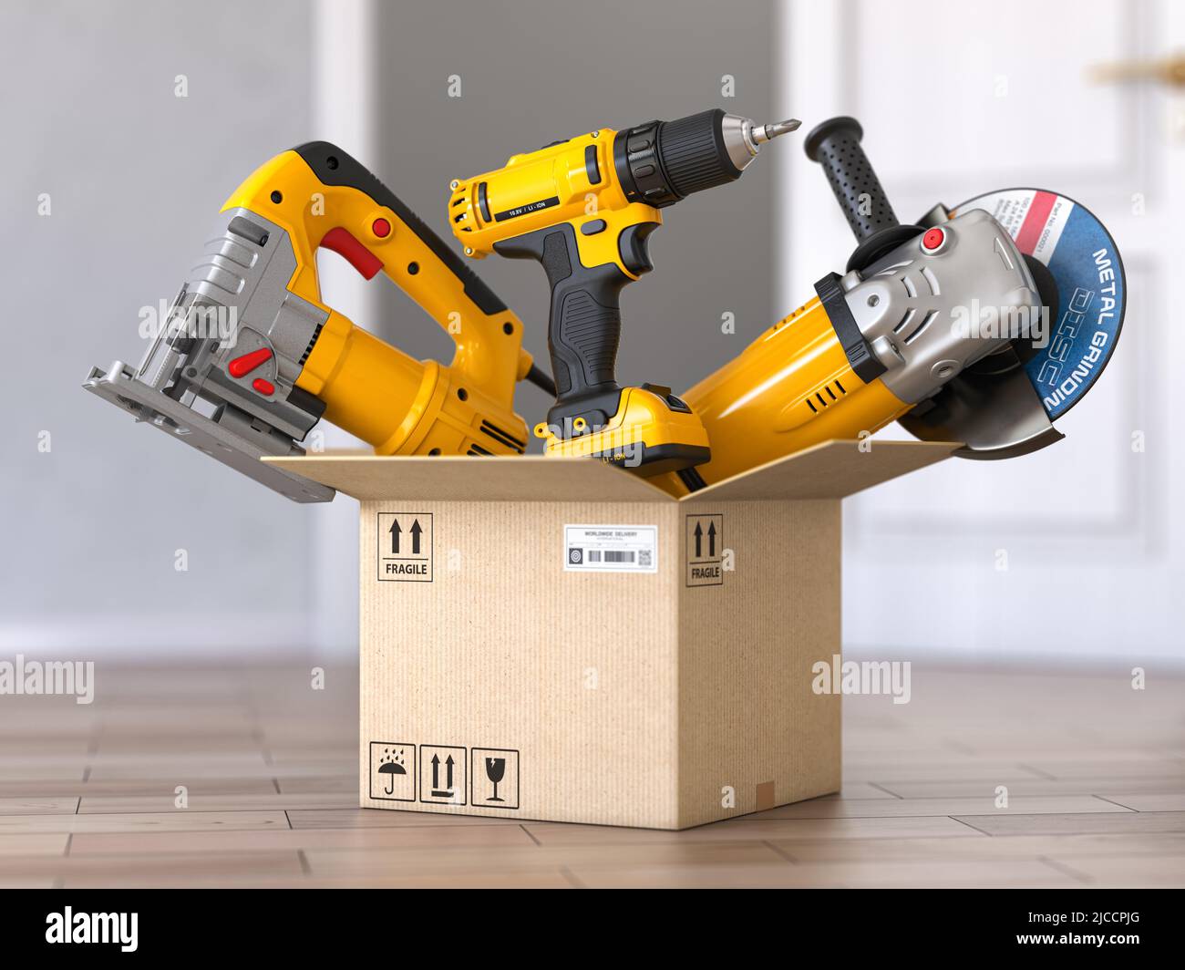 Cardboard box with elecric tools and construction equipment angle ...