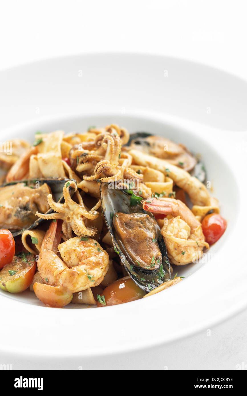 mixed seafood traditional stir fry laksa spicy curry in malaysia Stock