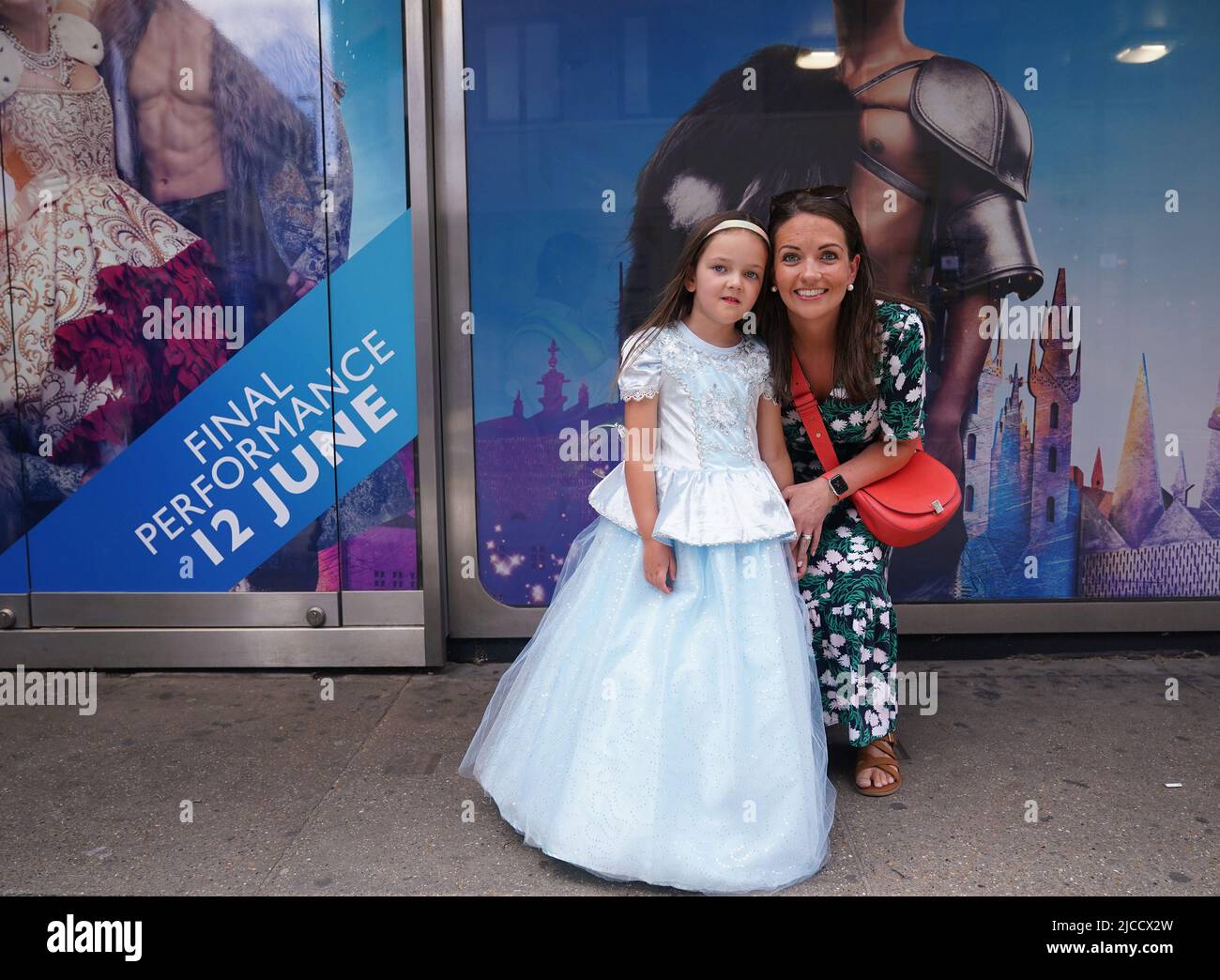 Claire Carmier with her daughter (name withheld) queuing at the Gillian Lynne Theatre in Drury Lane, London, to see the last performance of Cinderella. The Andrew Lloyd Webber production will close less than a year after its premiere. Picture date: Sunday June 12, 2022. Stock Photo