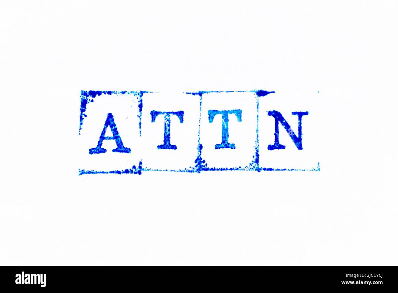 Blue color ink rubber stamp in word ATTN (Abbreviation of attention) on