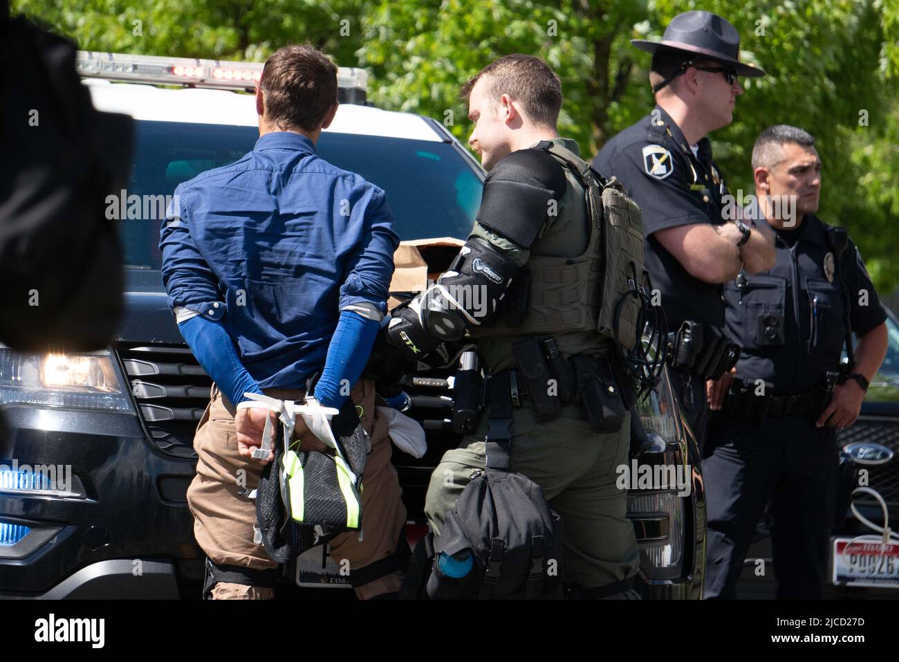 June 11, 2022, Coeur d' Alene, Idaho, USA: 31 members of the white nationalist group Patriot Front were arrested outside of Mceuen Park in downtown Coeur d'Alene, Idaho, on conspiracy to riot charges. (Credit Image: © Jake Lee Green/ZUMA Press Wire) Stock Photo