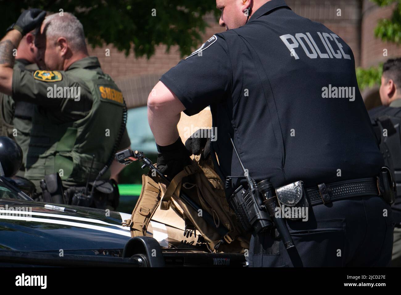 June 11, 2022, Coeur d' Alene, Idaho, USA: 31 members of the white nationalist group Patriot Front were arrested outside of Mceuen Park in downtown Coeur d'Alene, Idaho, on conspiracy to riot charges. (Credit Image: © Jake Lee Green/ZUMA Press Wire) Stock Photo