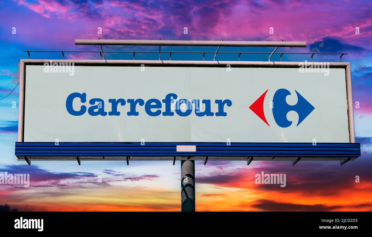 POZNAN, POL - MAY 1, 2022: Advertisement billboard displaying logo of Carrefour, a French multinational corporation specialized in retail Stock Photo