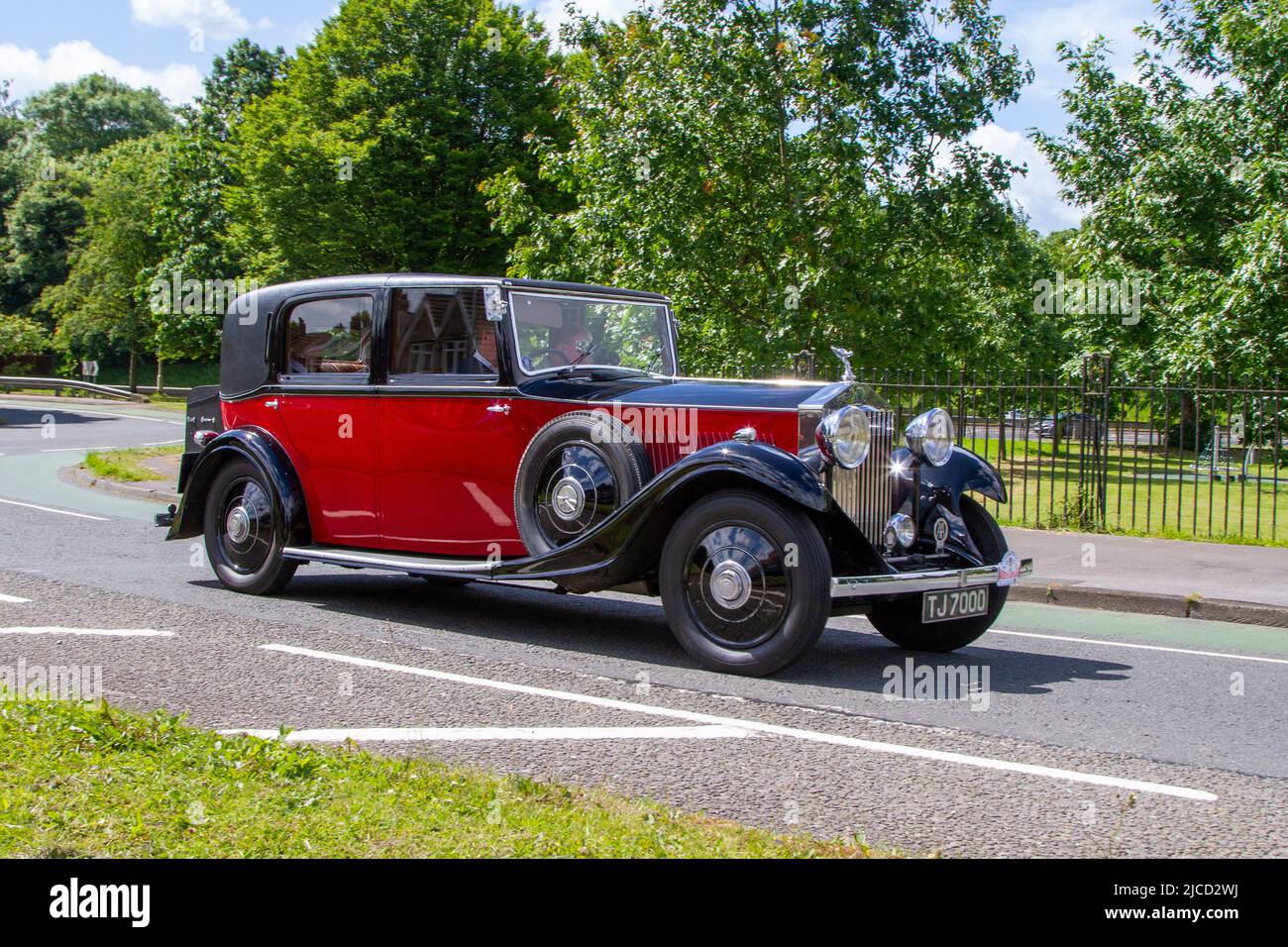 Manchester, UK. Weather.  12 June, 2022. Roy & David Brooks  drive in the 58th and final Manchester to Blackpool Touring Assembly for Veteran, Vintage, Classic, and Cherished automobiles on a beautiful bright day in their 1934 3500cc Black 1934 Rolls-Royce Phantom II Continental Sports Saloon;    Credit: MediaWorldImages/AlamyLiveNews Stock Photo