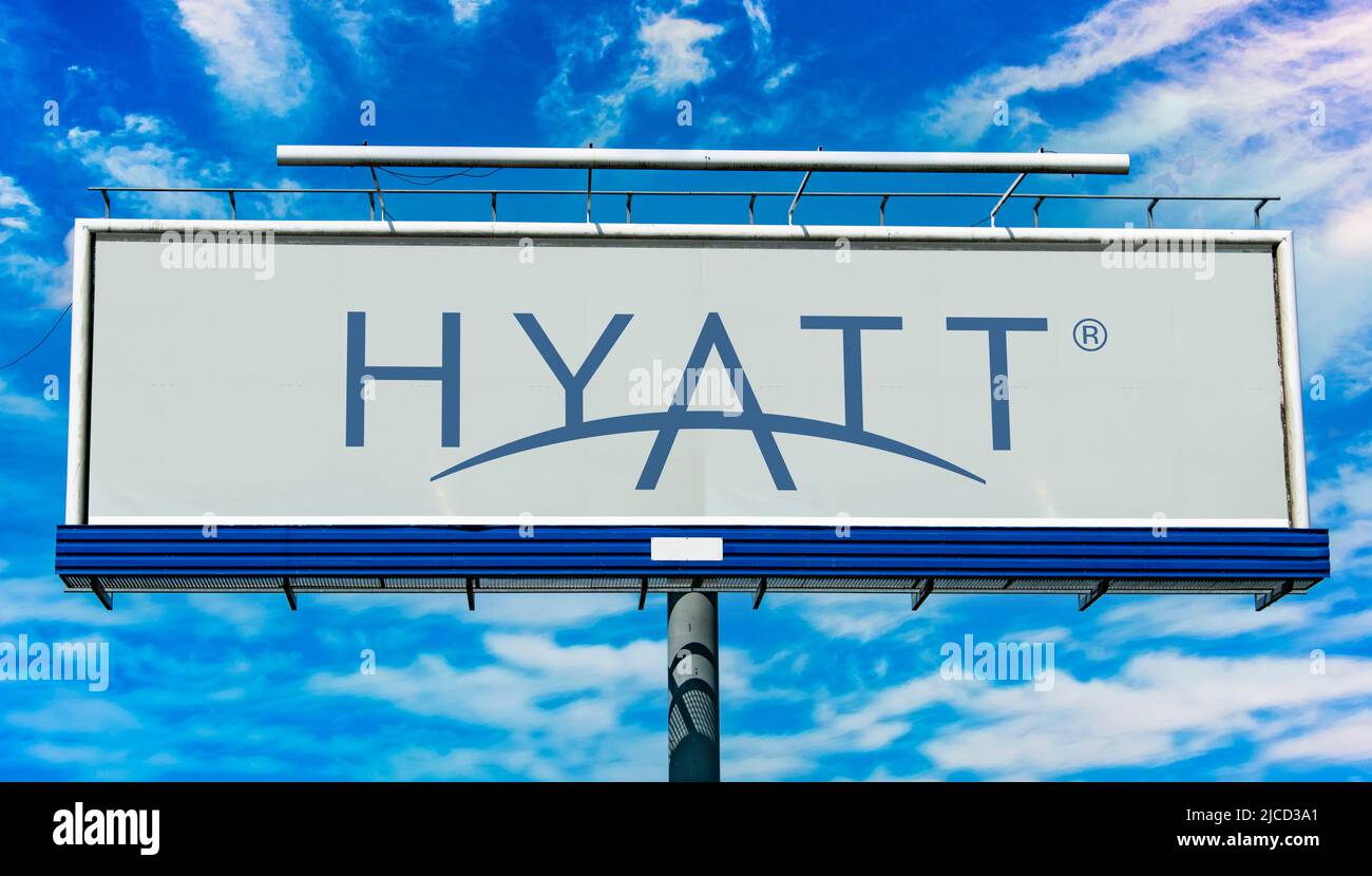 POZNAN, POL - MAY 1, 2022: Advertisement billboard displaying logo of Hyatt Hotels, a hospitality company that manages and franchises luxury and busin Stock Photo
