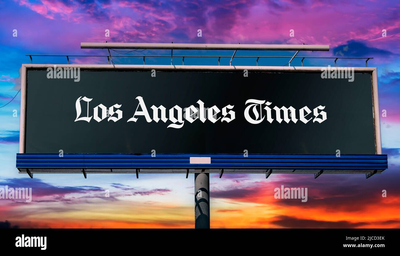 POZNAN, POL - MAY 1, 2022: Advertisement billboard displaying logo of The Los Angeles Times, a daily newspaper published in Los Angeles, California si Stock Photo