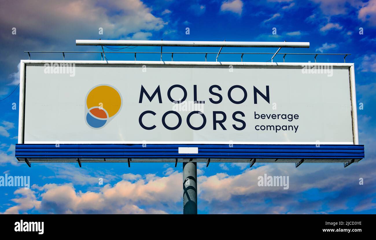 POZNAN, POL - MAY 1, 2022: Advertisement billboard displaying logo of The Molson Coors Beverage Company, a multinational drink and brewing company hea Stock Photo