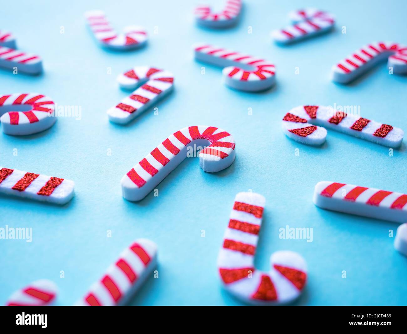 Christmas pattern with candies on blue background Stock Photo