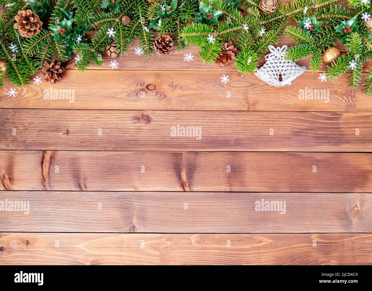 Christmas background with fir branches, cones, snowflakes and decorations Stock Photo