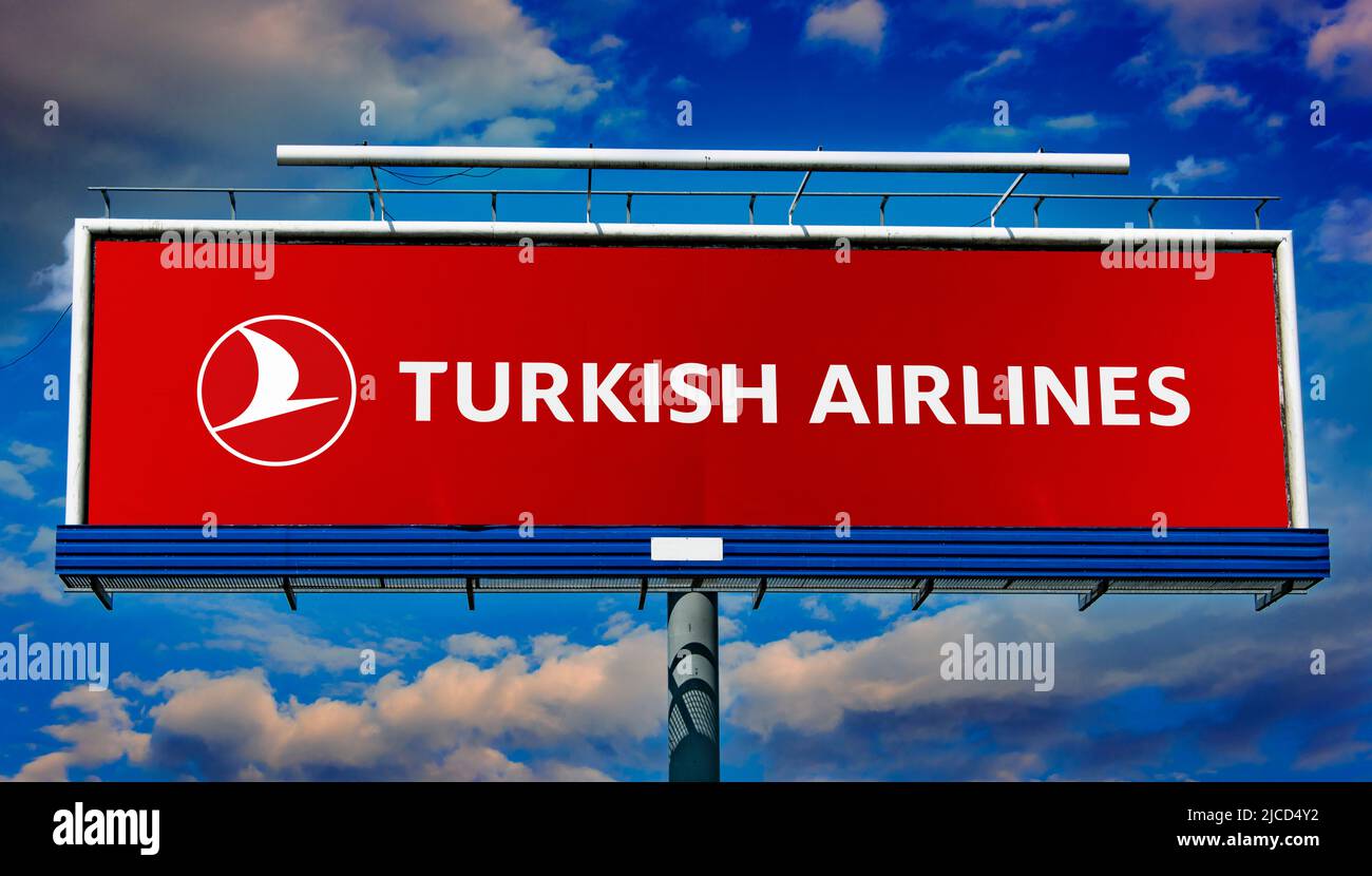 POZNAN, POL - MAY 1, 2022: Advertisement billboard displaying logo of Turkish Airlines, the national flag carrier airline of Turkey Stock Photo