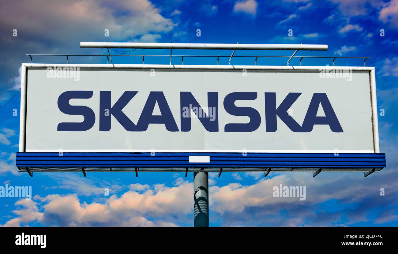 POZNAN, POL - MAY 1, 2022: Advertisement billboard displaying logo of Skanska AB, a multinational construction and development company based in Sweden Stock Photo