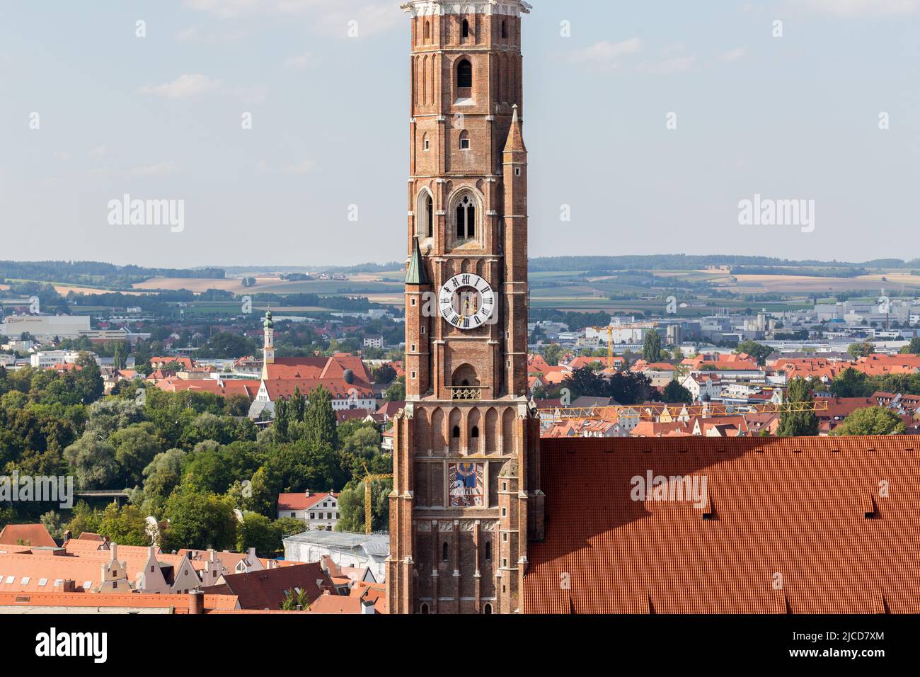 Landshut, Germany - Aug 14, 2021: Close up view of the steeple of basilica St. Martin. The tallest brick tower of a church in the world. Stock Photo
