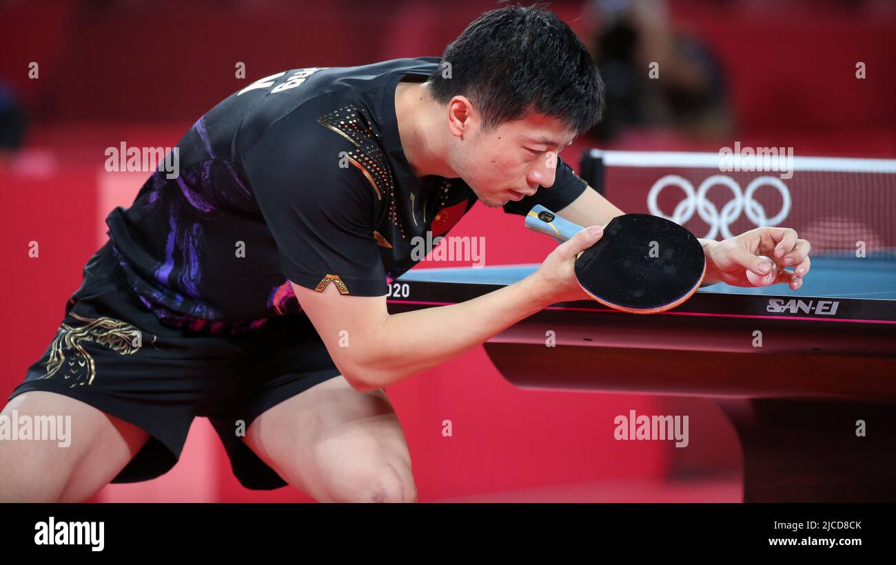 JULY 30th, 2021 - TOKYO, JAPAN: Ma Long of China serves during the Table Tennis Men's Singles Gold Medal Match at the Tokyo 2020 Olympic Games (Photo Stock Photo