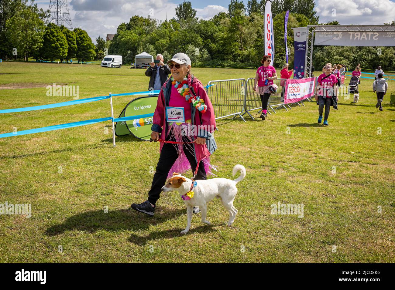 12 June 2022; Warrington Cheshire, UK; Race for Life in Victoria Park in aid of Cancer Research. The race begins for those walking the course Credit: John Hopkins/Alamy Live News Stock Photo
