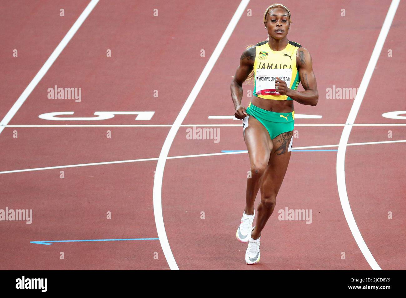 JULY 31st, 2021 - TOKYO, JAPAN: Elaine Thompson-Herah of Jamaica in action during the Women's 100m Semi-Finals at the Tokyo 2020 Olympic Games (Photo: Stock Photo