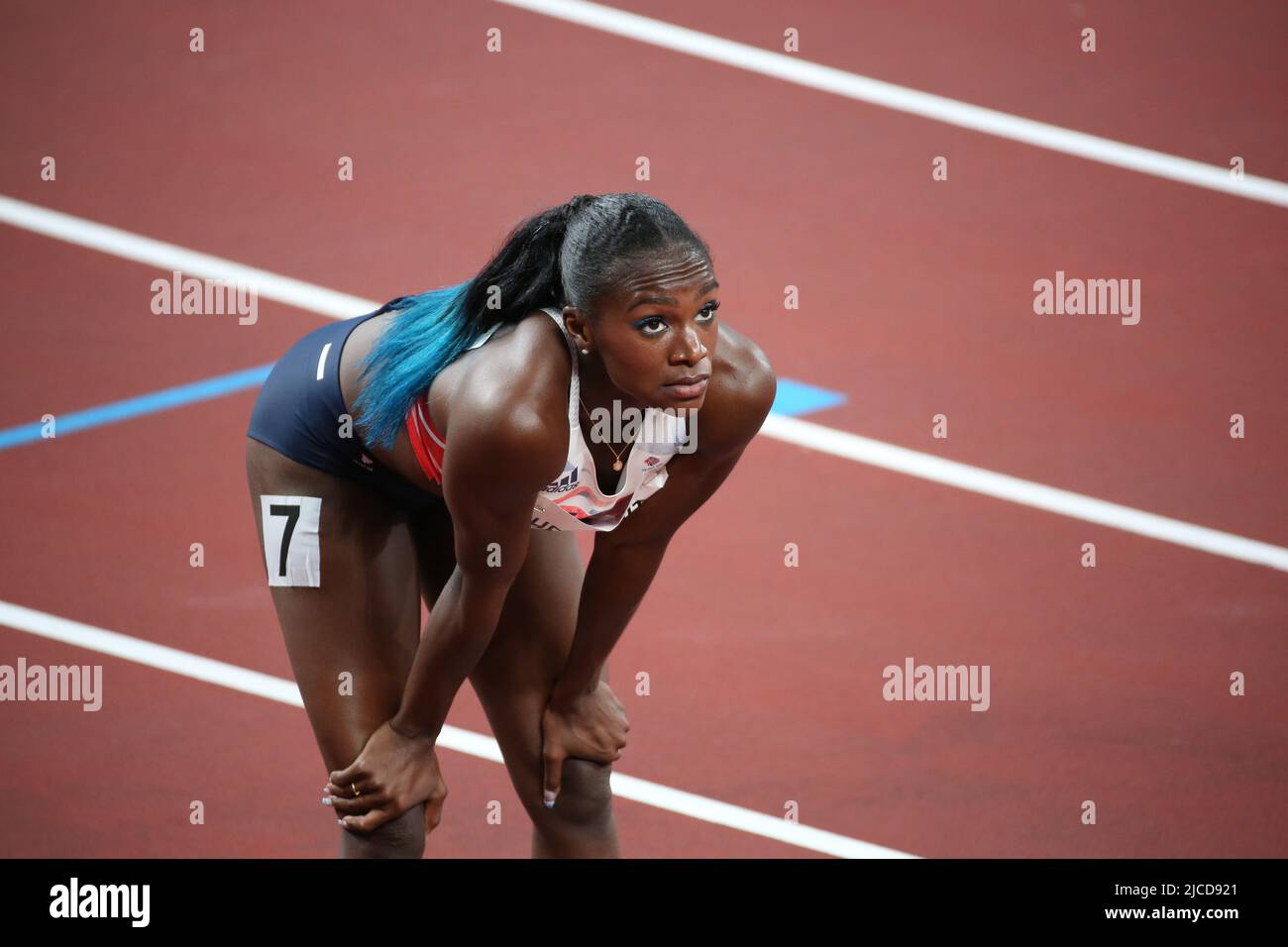 JULY 31st, 2021 - TOKYO, JAPAN: Dina Asher-Smith reacts finishing third in 11.05 the Women's 100m Semi-Final 1 behind Ajla del Ponte of Switzerland in Stock Photo