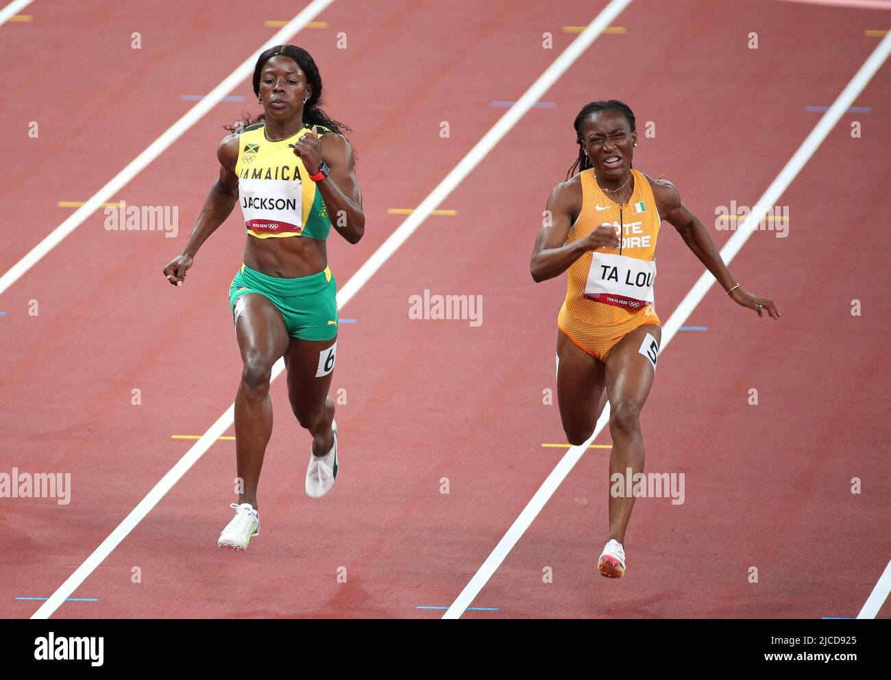 JULY 31st, 2021 - TOKYO, JAPAN: Shericka Jackson of Jamaica and Marie-Josee Ta Lou of Ivory Coast in action during the Women's 100m Semi-Finals at the Stock Photo