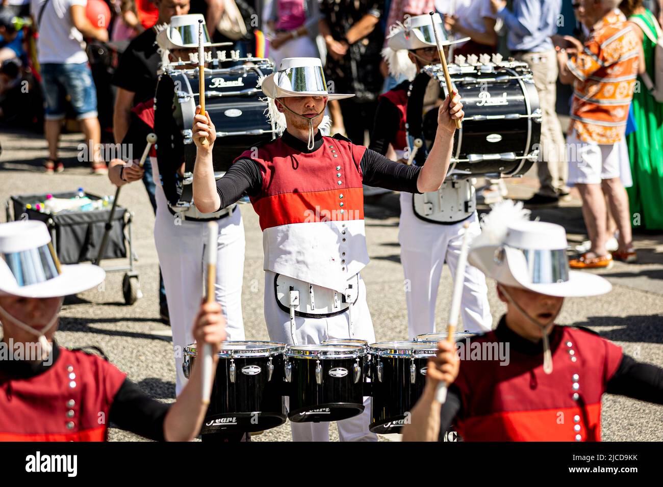 Hanover, Germany. 12th June, 2022. Members of the show band Spirit of 52 Rastede walk past the audience playing music during the 'Parade of Diversity' as part of the 37th Day of Lower Saxony. Credit: Moritz Frankenberg/dpa/Alamy Live News Stock Photo