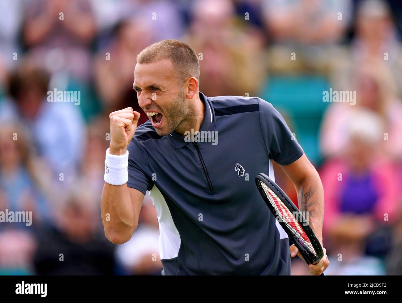 Great Britain's Dan Evans celebrates during his men's singles final
