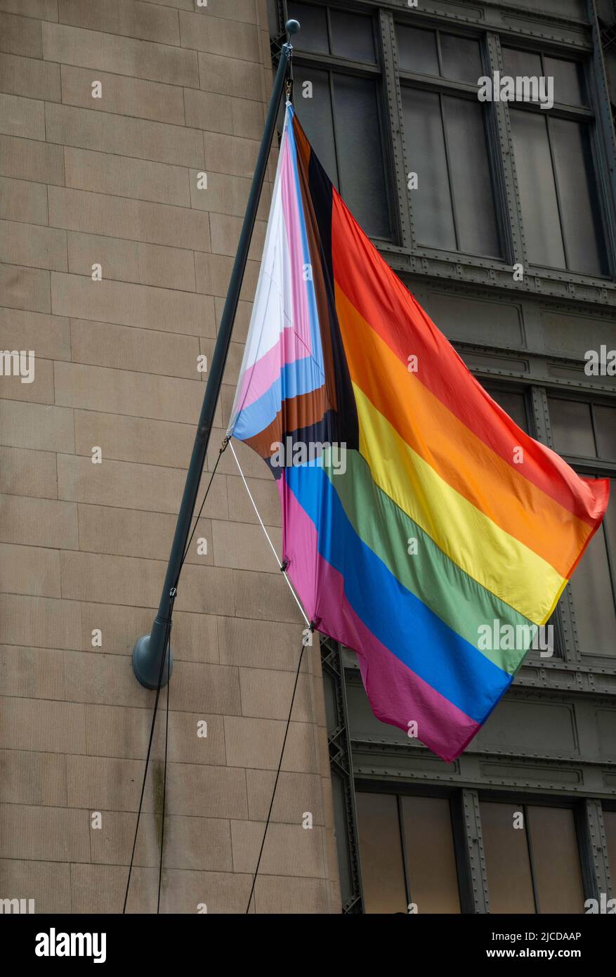 LGBTQ Progress Pride Flag displayed in New York City, USA  2022 Stock Photo