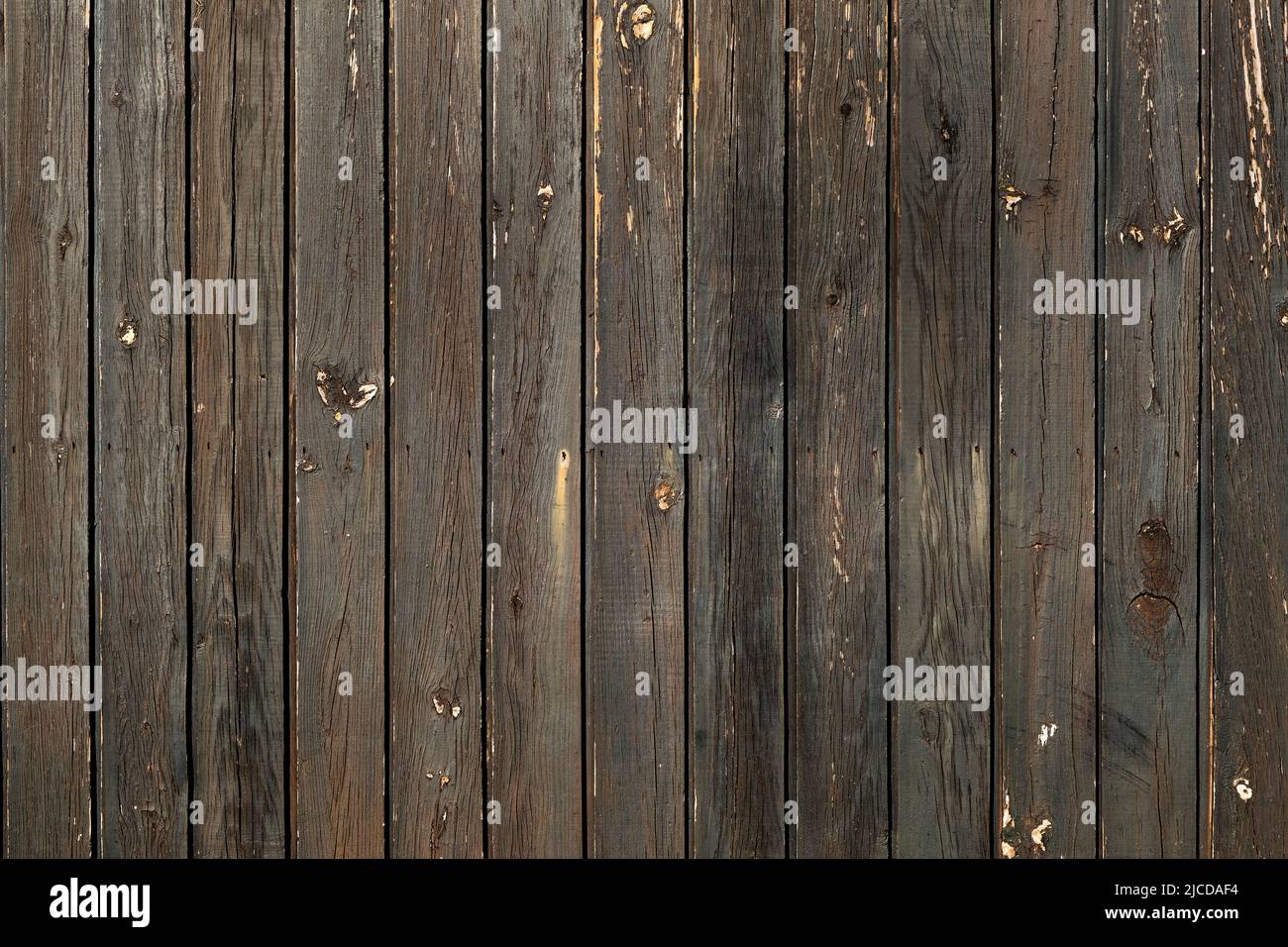 Dark brown painted rustic wooden cabin wall background Stock Photo