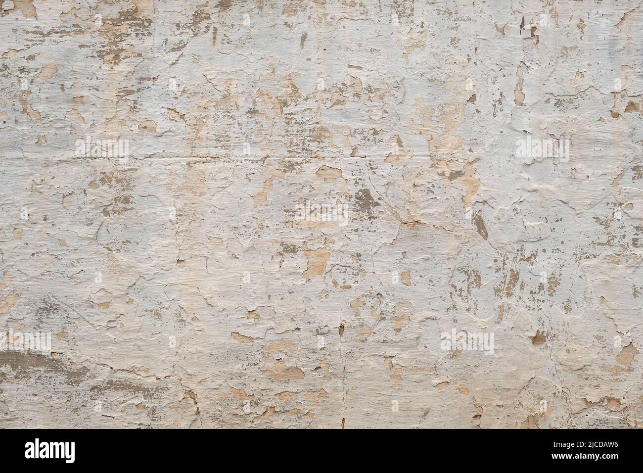 Old white limewashed wall with damp, distressed grunge background Stock Photo