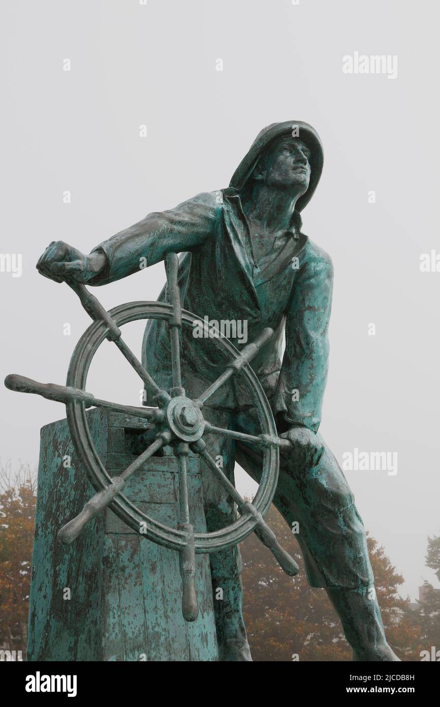 the Fisherman's Memorial in Gloucester, Massachusetts on a foggy day. Stock Photo