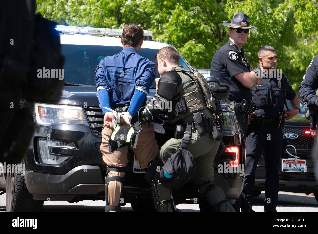 June 11, 2022, Coeur d' Alene, Idaho, USA: Police search members of the ...