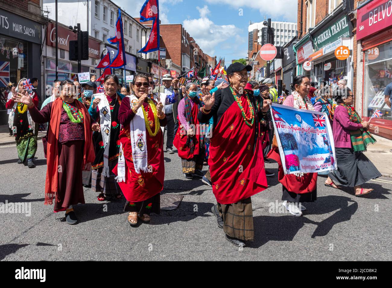 Nepali people, Nepalese Help Maddhat Shamua organisation in the Grand Parade at Victoria Day, an annual event in Aldershot, Hampshire, England, UK Stock Photo