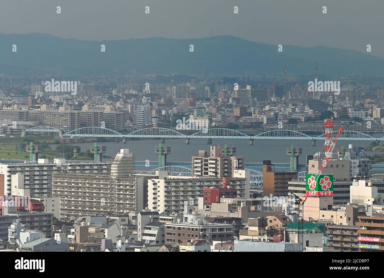 View across the Yodogawa River from Umeda towards Shin Osaka, Kansai JP Stock Photo