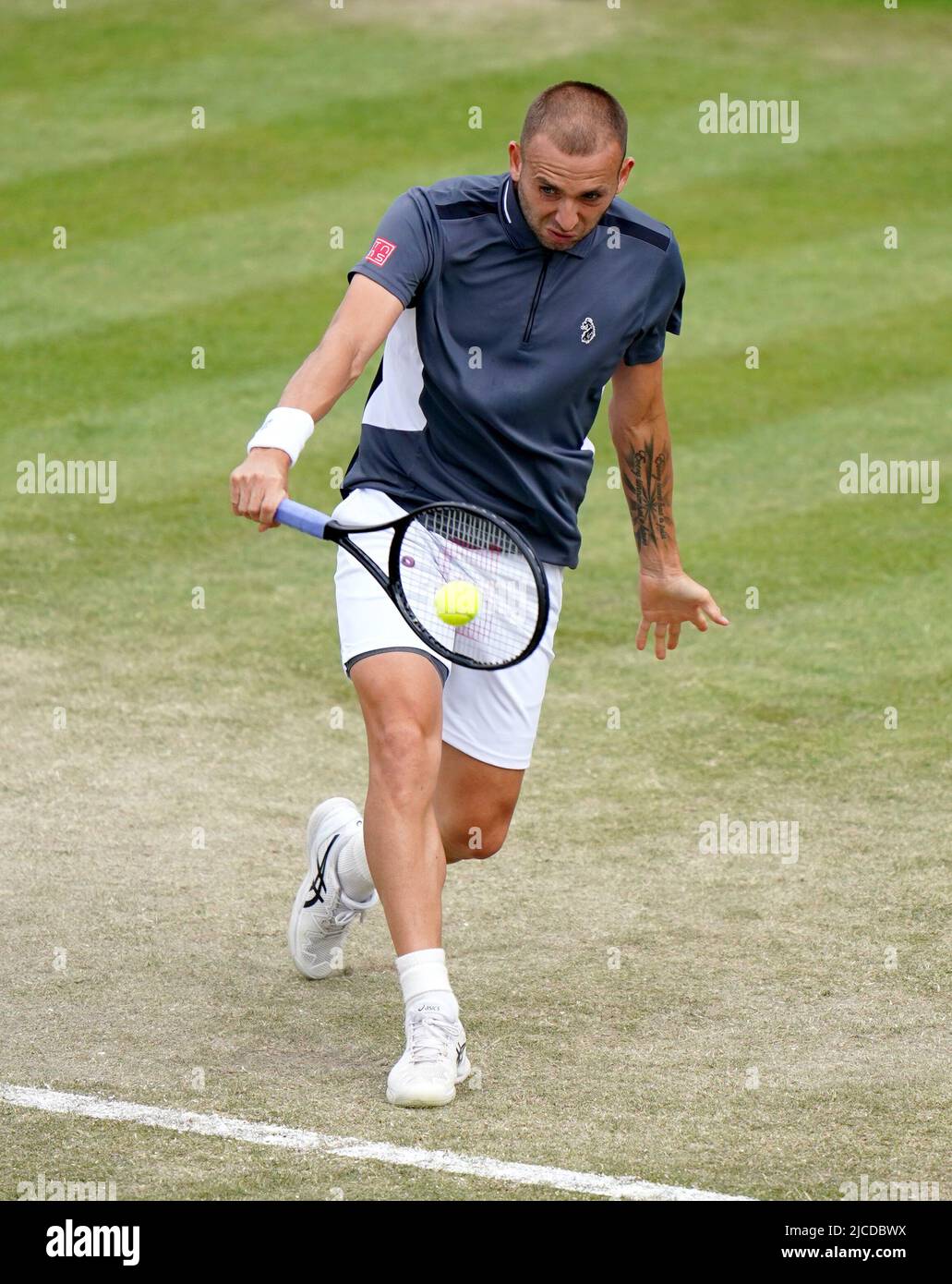 Great Britain's Dan Evans in action during his men's singles final