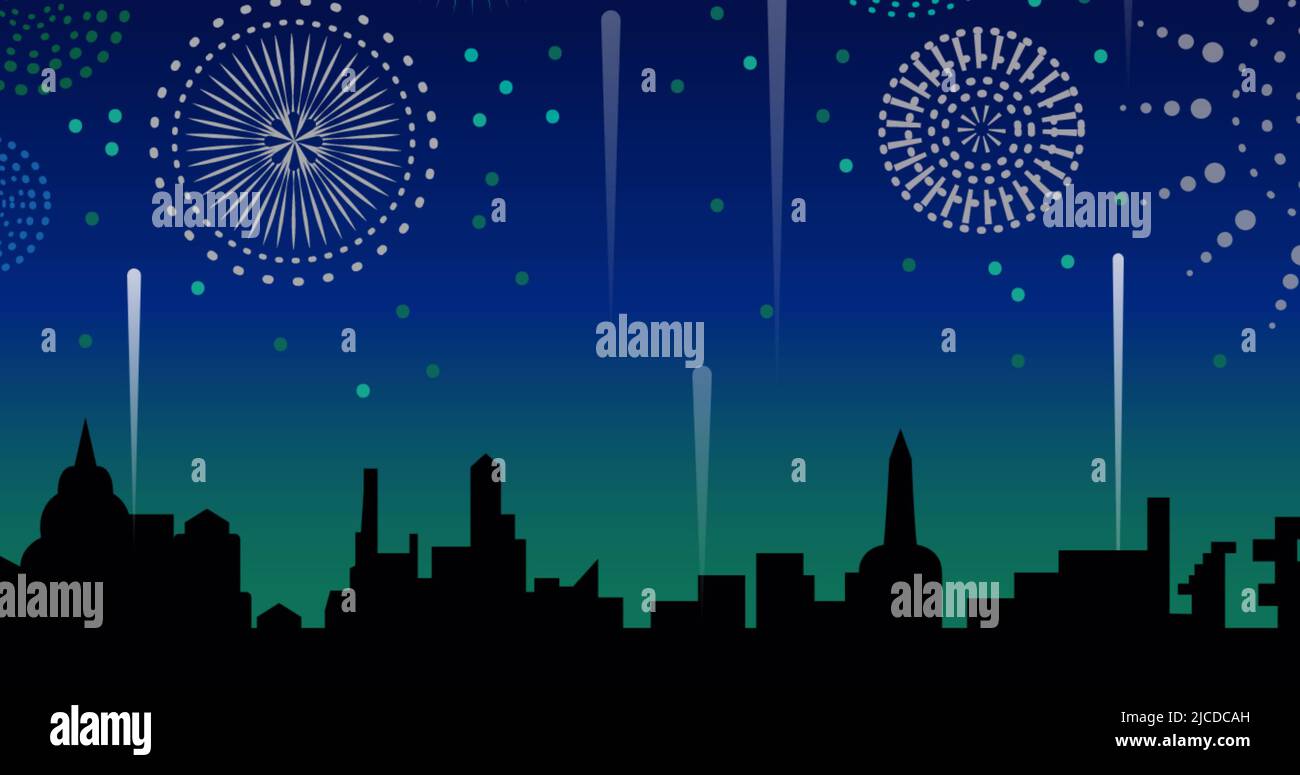 Image of green, white and blue fireworks exploding in sky above city Stock Photo